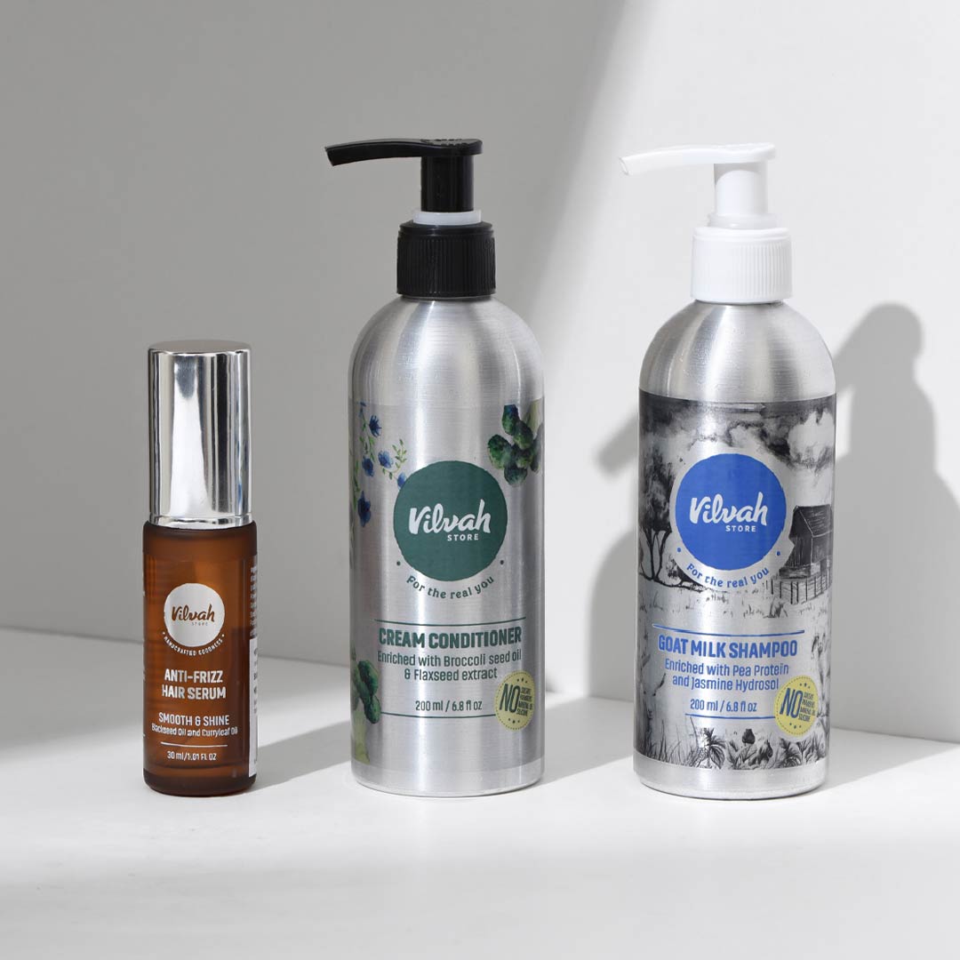 Vilvah's frizz-free hair combo - goat milk shampoo, cream conditioner, and anti-frizz hair serum
